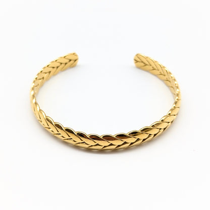Braided gold cuff bracelet in polished finish