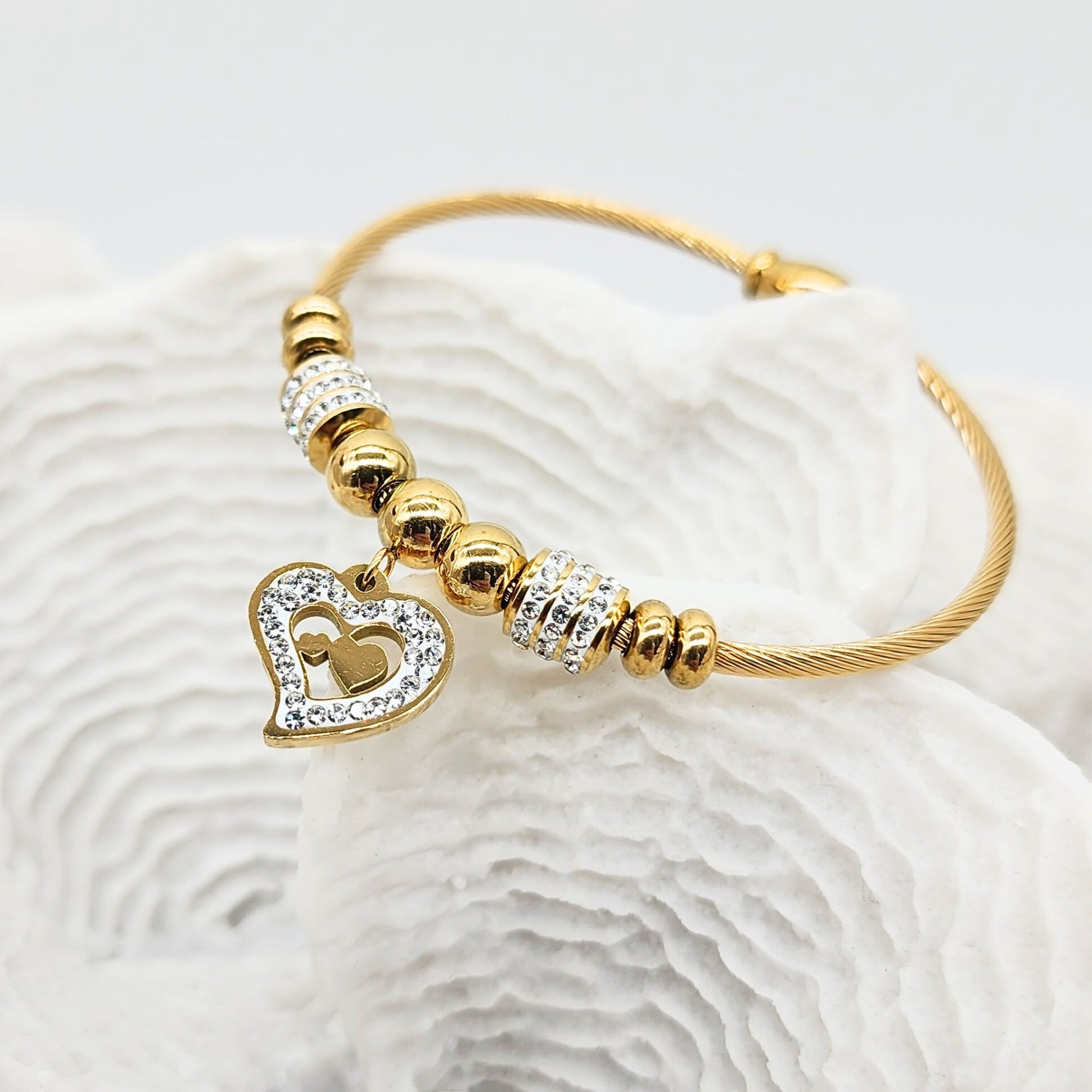 18k gold-plated heart bracelet styled on white coral with magnetic clasp