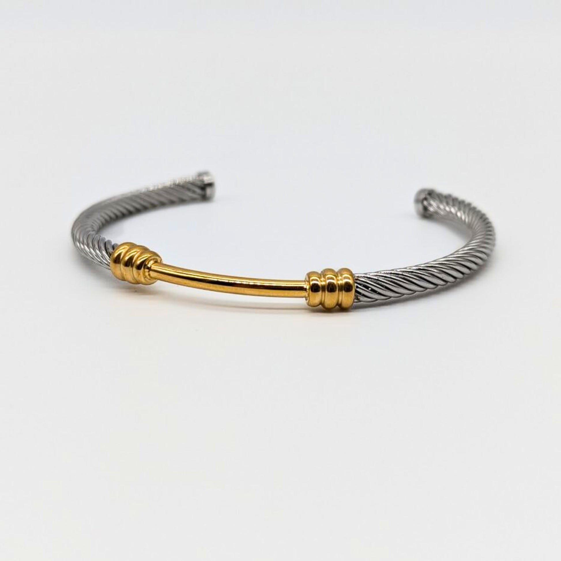 Close-up of gold and silver rope bangle – waterproof and tarnish-resistant